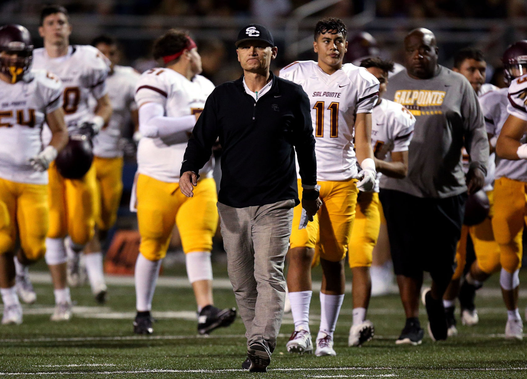 Sapolinte HS football coach Dennis Bene